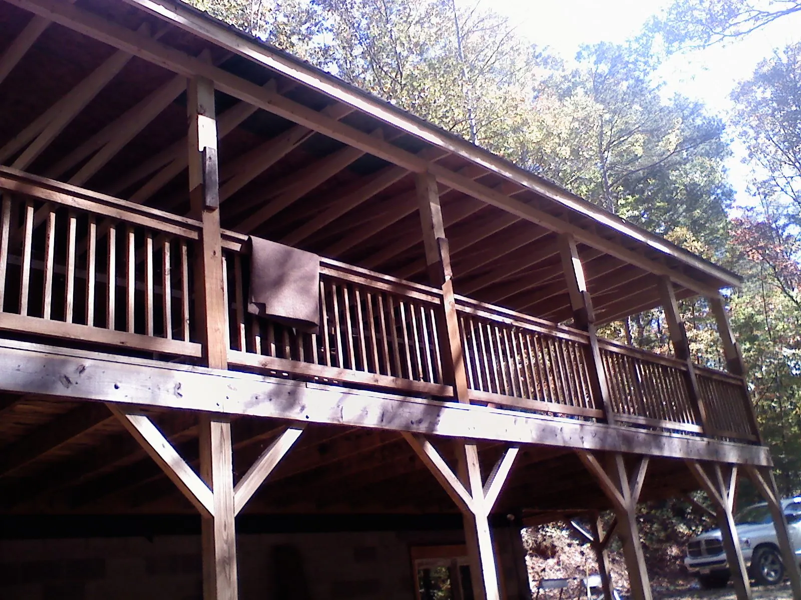 Timber framing under a new elevated porch and deck — Roof Leak Repair in Bostwick by Roofing Brothers